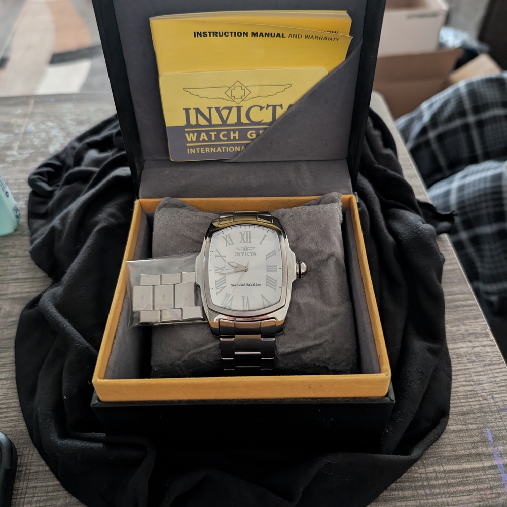 Invicta Silver and Black Watch with Roman Numerals